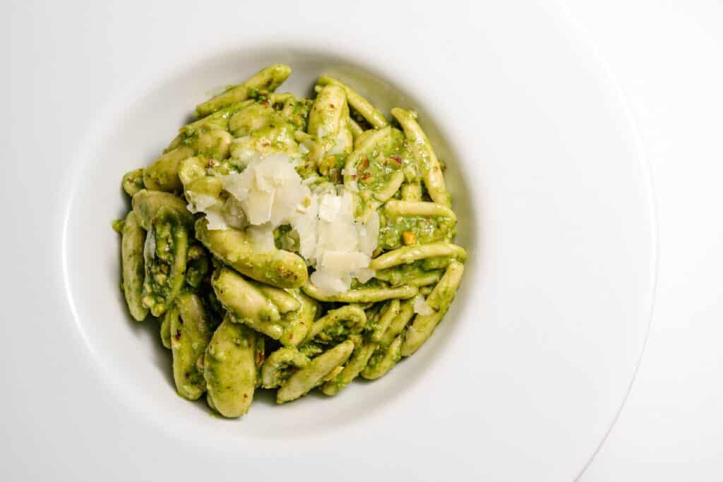 Cavatelli pasta served with pesto sauce at a restaurant using VEDE Pasta
