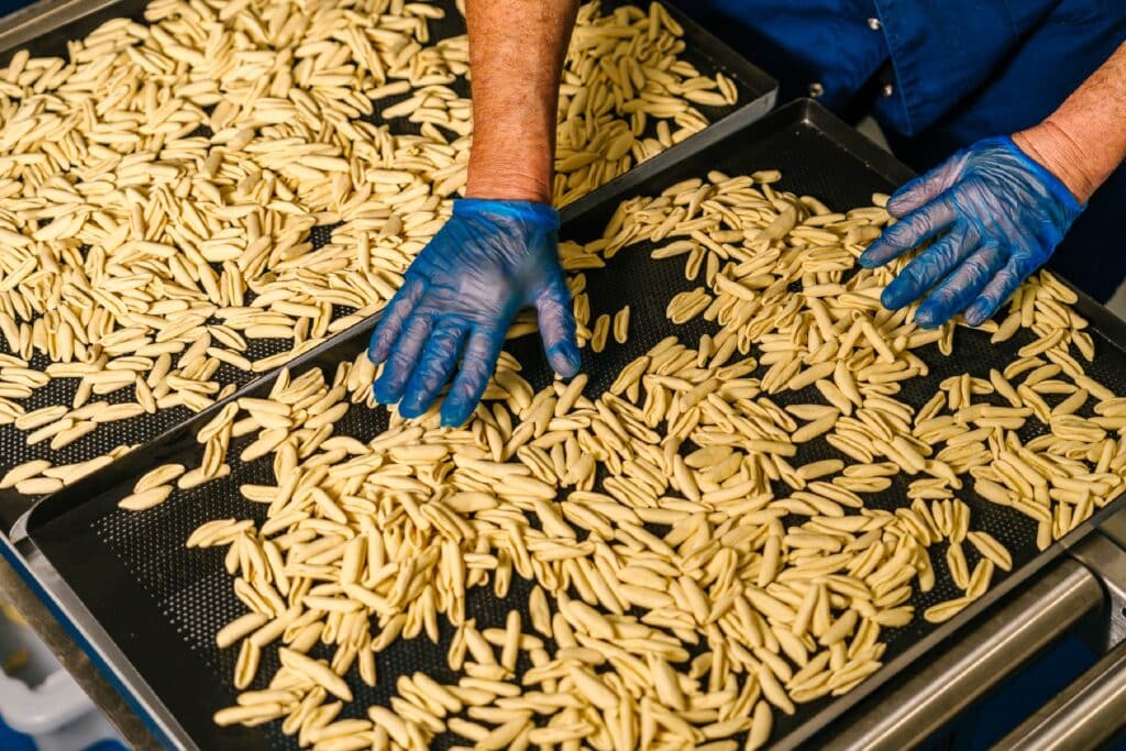 Cavatelli pasta being hand-shaped and produced at VEDE Pasta's Brisbane factory