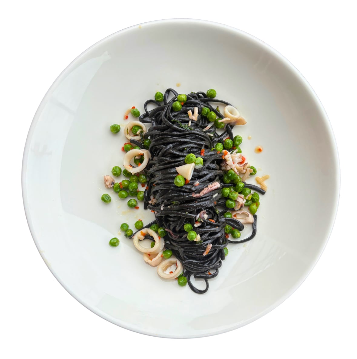 Vede Squid Ink Linguini with Calamari and Chilli Squid ink pasta with calamari and seafood – Vede Pasta’s black linguini served with prawns, lemon, and herbs